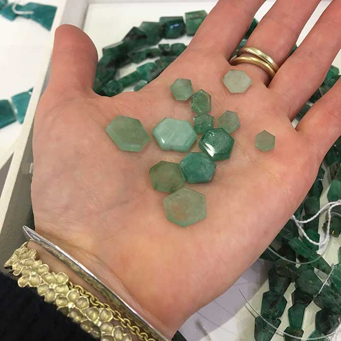 Loose emeralds at AGTA
