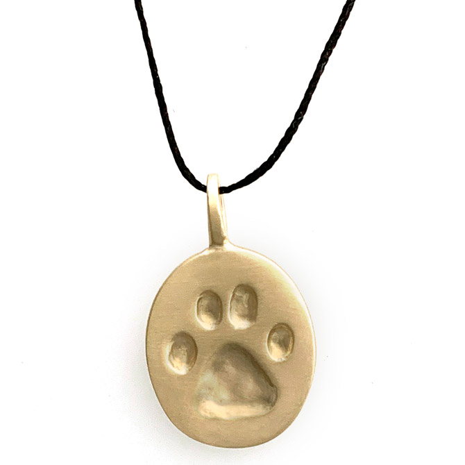 Judi Powers 10k Paw for a Cause pendant