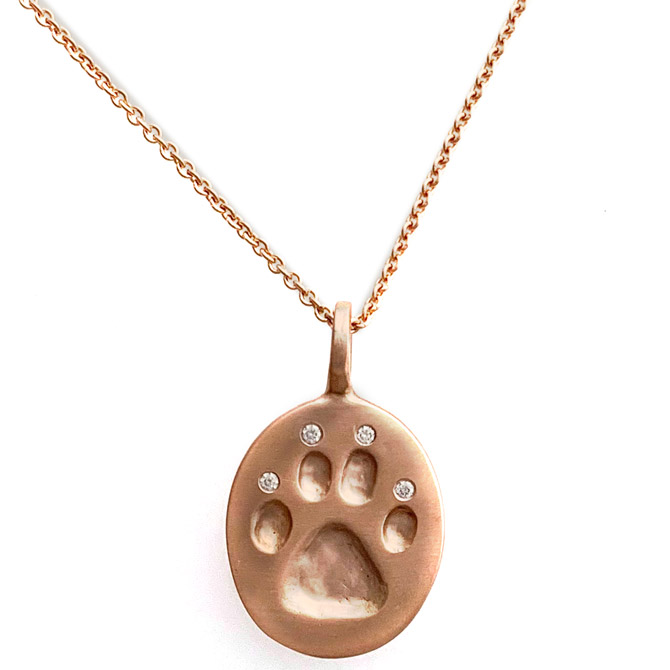 Judi Powers diamond Paw for a Cause pendant