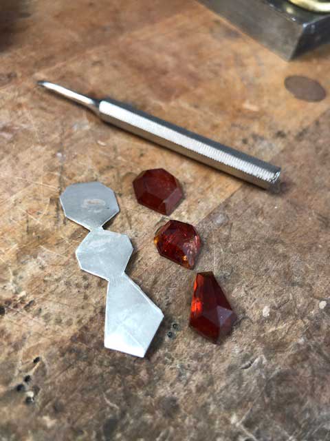 Whtiney Abrams hessonite garnet pendant layout