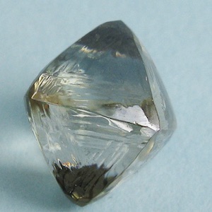 Coated synthetic moissanite