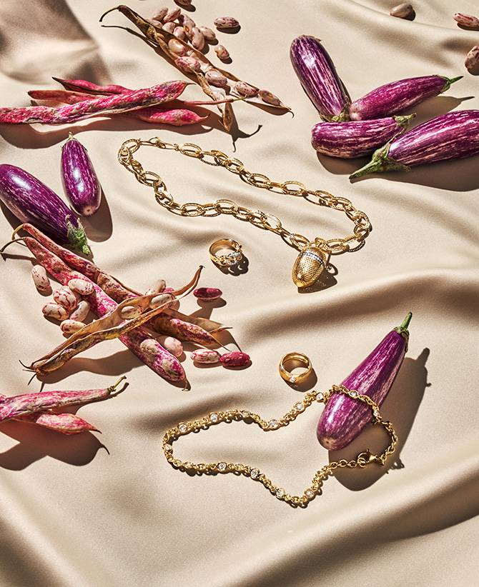 gold jewelry and eggplants