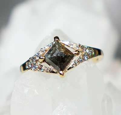 Facets of Earth engagement ring