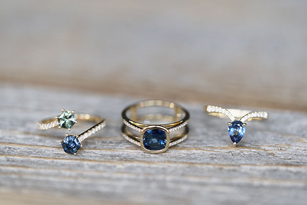 Kimberly Collins teal gemstone rings