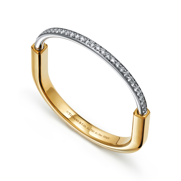 Theres always room for one more Layer TiffanyT bangles for a wrist that  speaks volumes Tiffany Tiffan  Tiffany and co jewelry Icon jewelry Tiffany  bangle