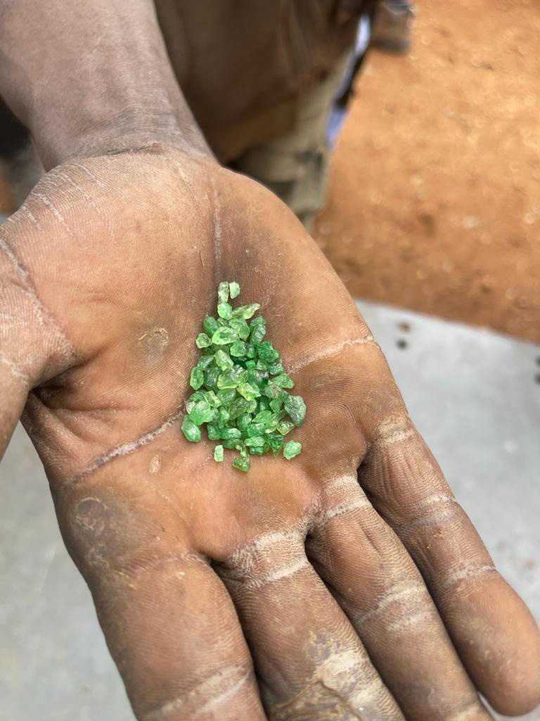 Green grossular garnets at a mine in Kenya