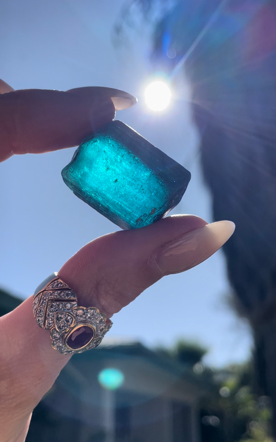 Pamela Hastry holds a tourmaline at mine in Namibia