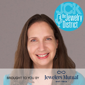 Susan Posnock of JA with The Jewelry District and Jewelers Mutual logos