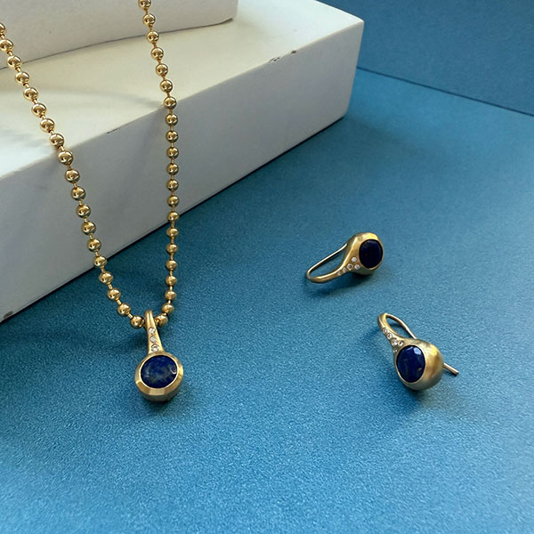 Sunlit ocean lapis droplets