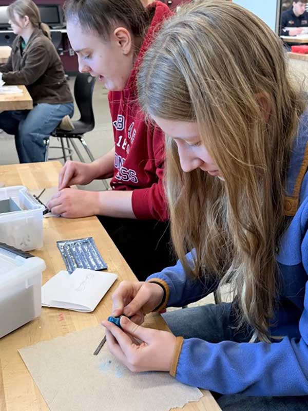 Students working Facets