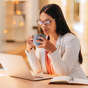 woman reading at laptop