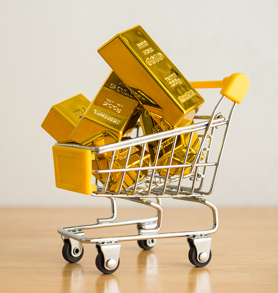 Gold bars in cart symbolizing OTC gold