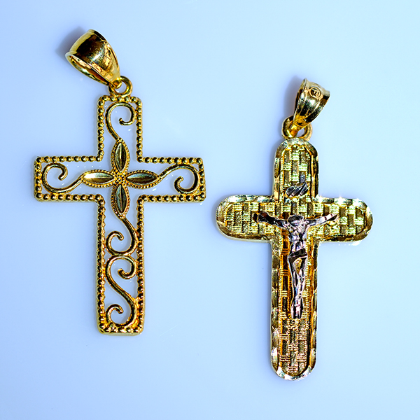Two lightweight 14k yellow gold pendants sold by the Diamond Doctor in 2026 during the holiday season